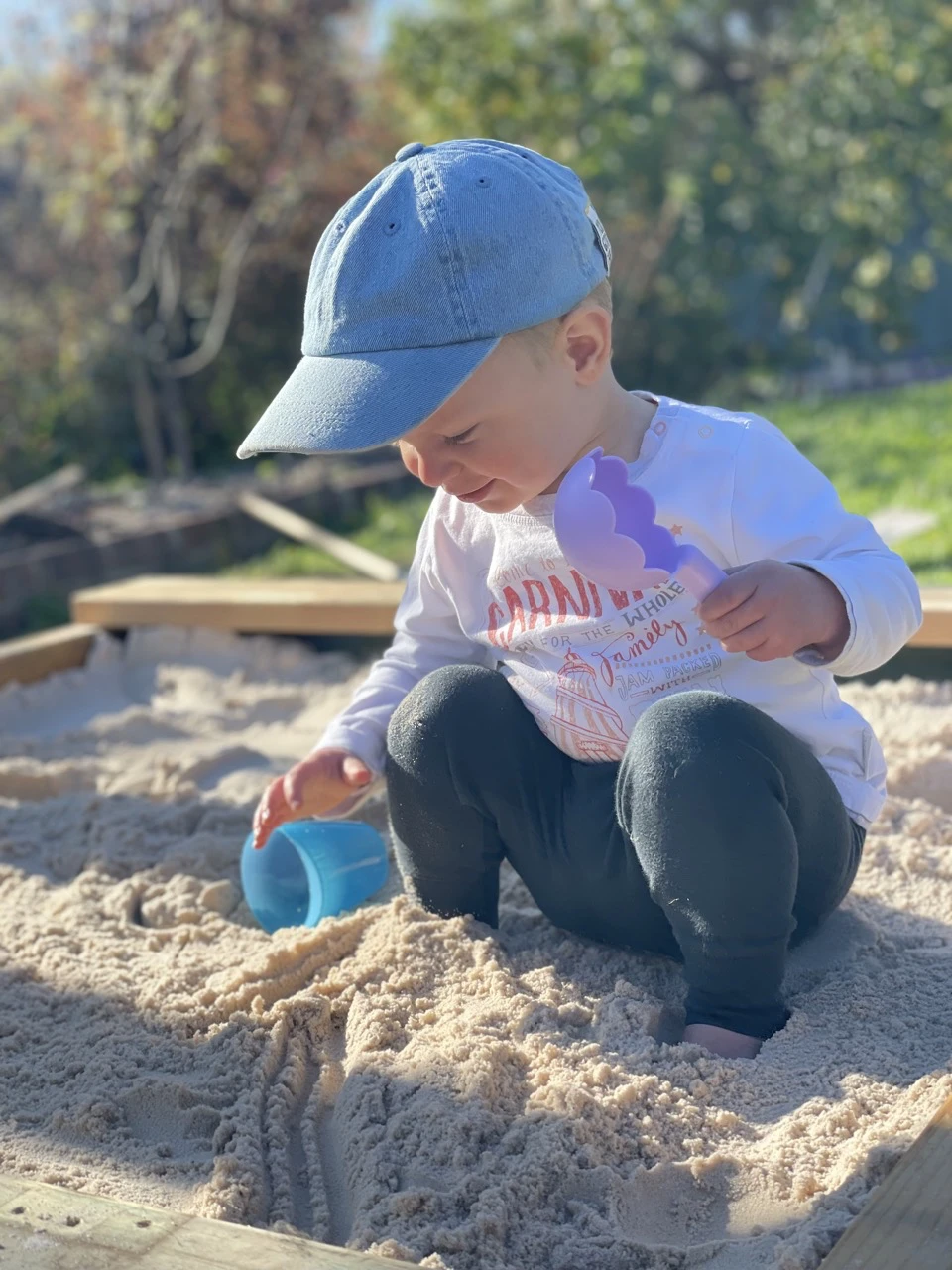 child in sandpit